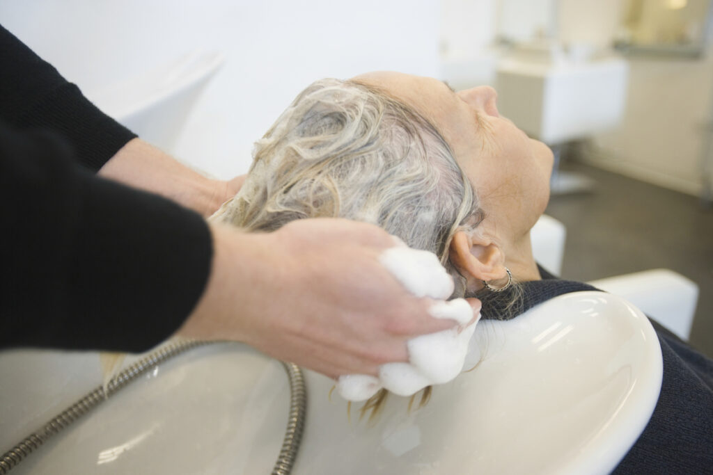 Senior Woman Getting Hair Wash at Salon_Ormond Beach Senior Living