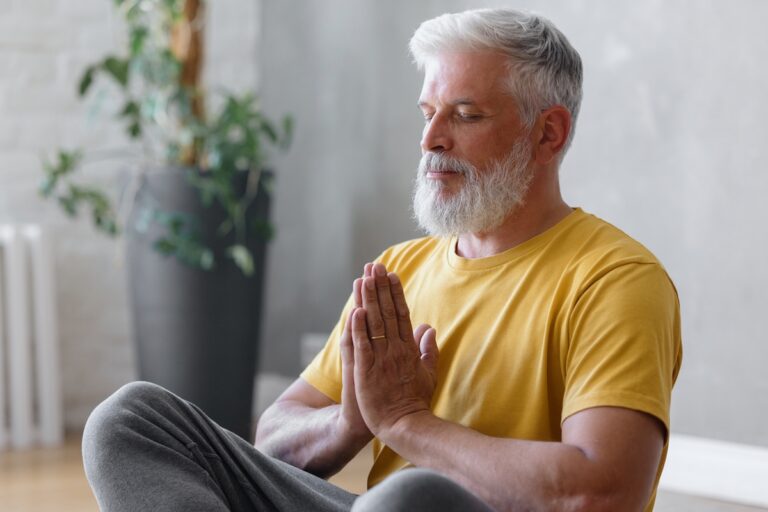 Senior Man Meditating_Stress and Mental Health