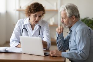 Senior Man Talking with Female Doctor_Dementia Diagnosis