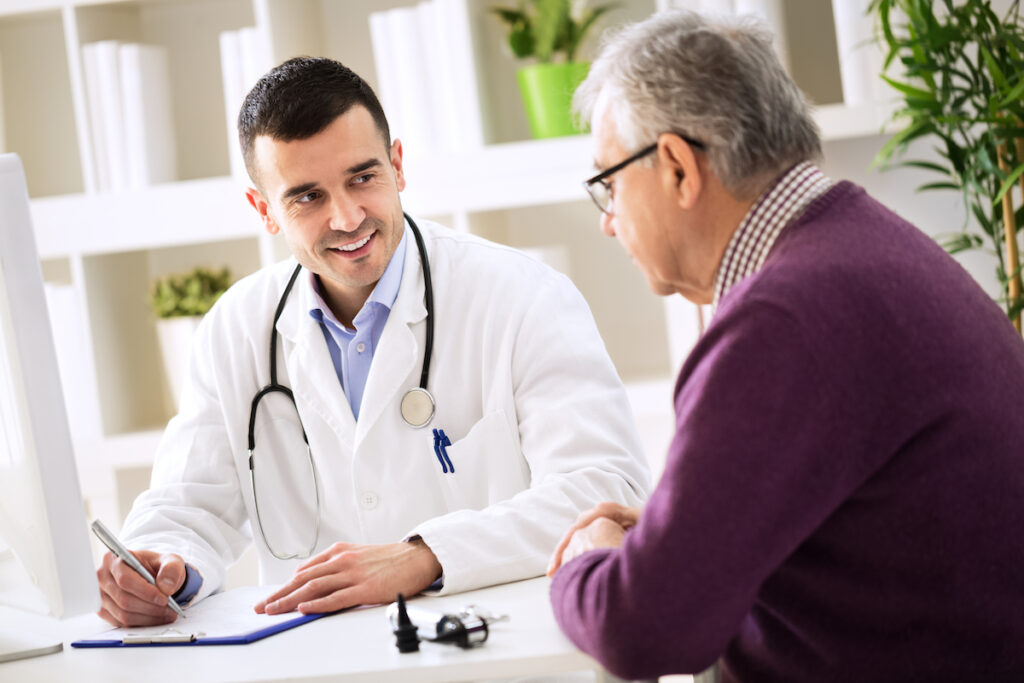 Senior Man Consulting with Male Doctor_Types of Dementia